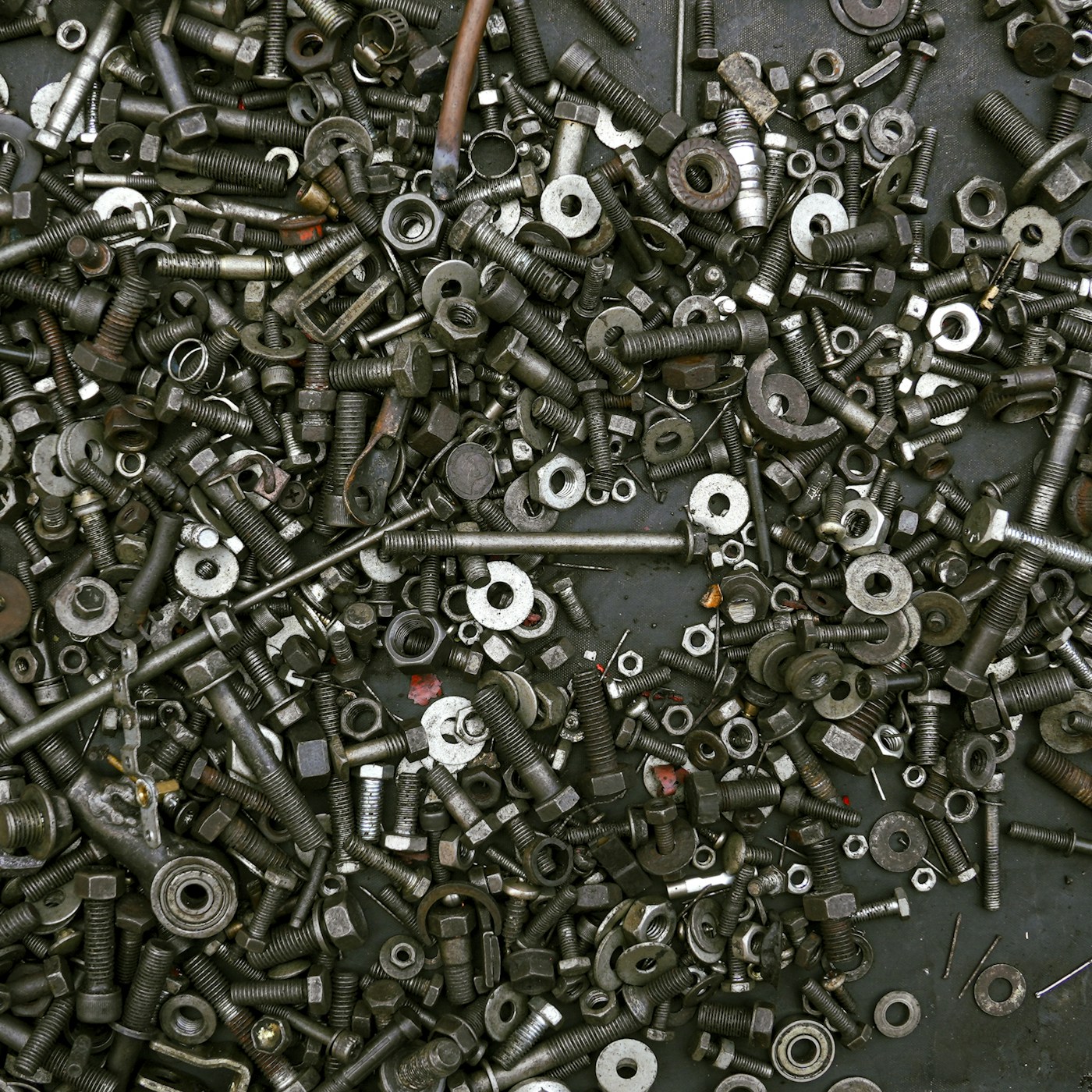 Raw metal fasteners before finishing